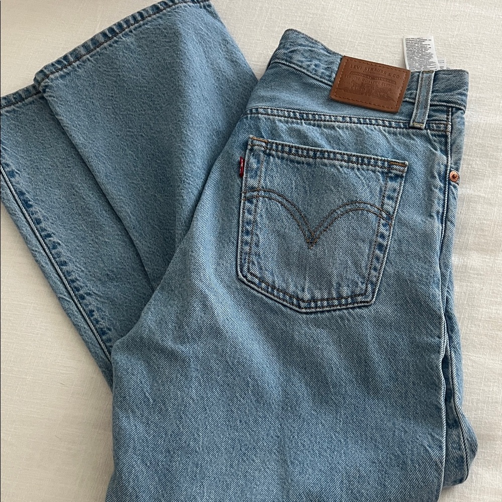 Levi rub cage straight ankle jeans distressed size 27